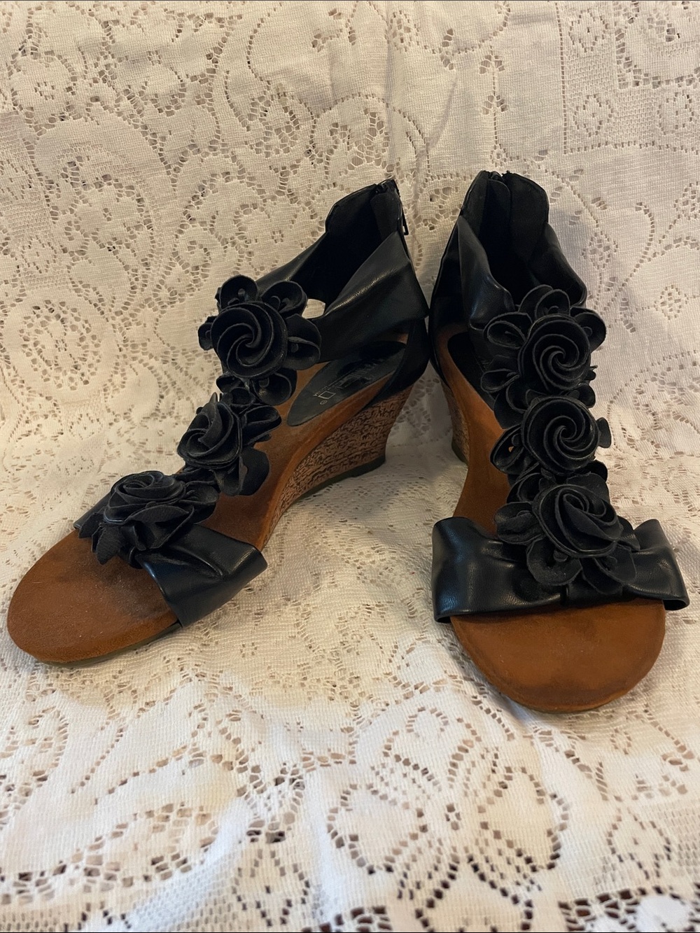 Black Floral Wedge Sandals with Decorative Rosettes